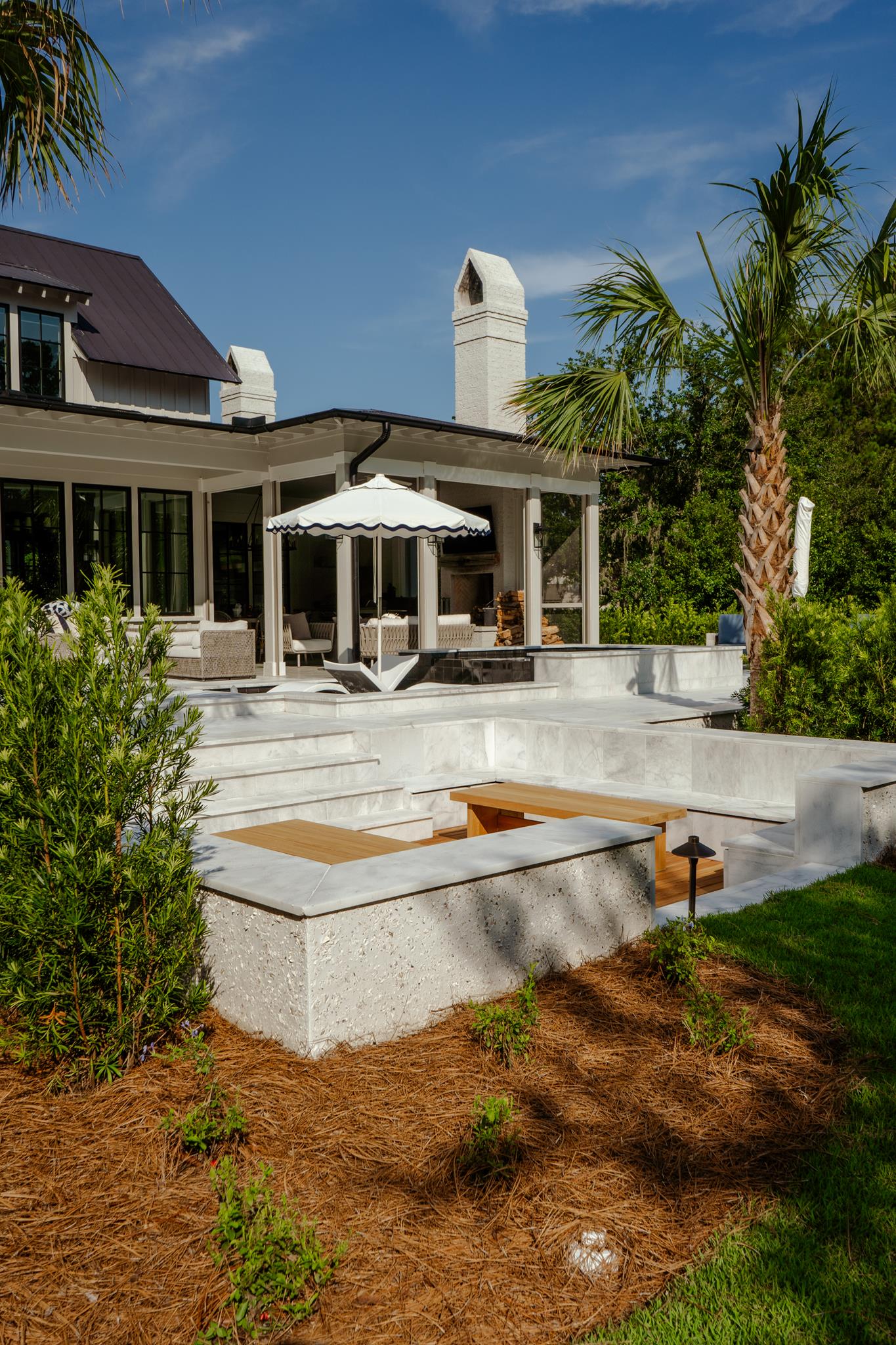 Crystal clear saltwater pool in a Bluffton SC backyard on a sunny day