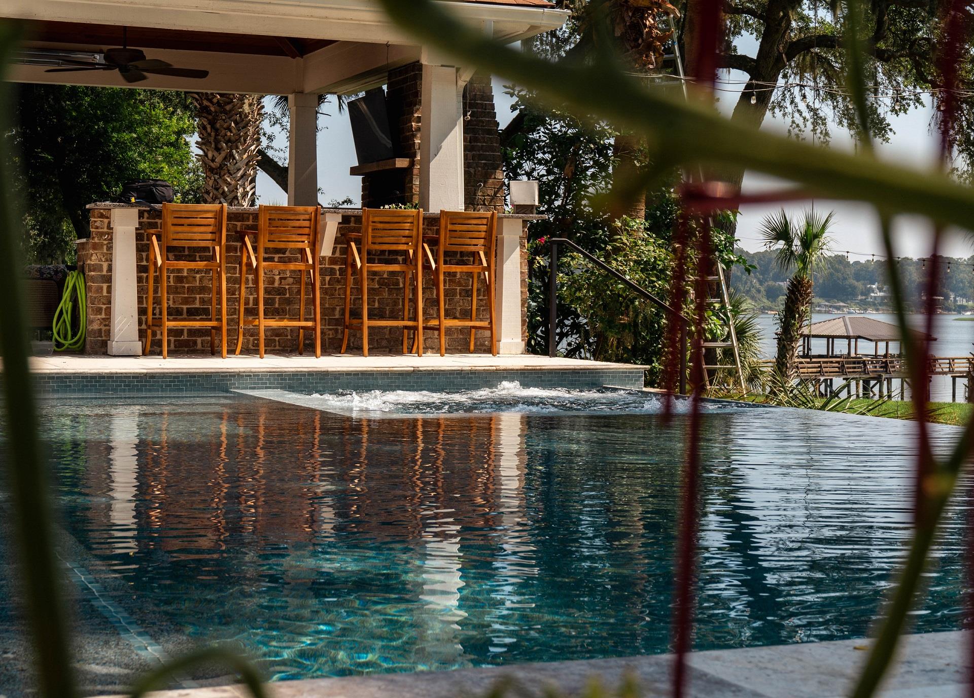 Custom pool and spa with water features in a Lowcountry backyard